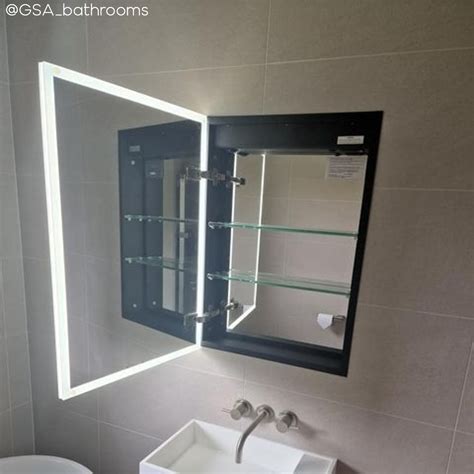 mirrored bathroom cabinets with socket